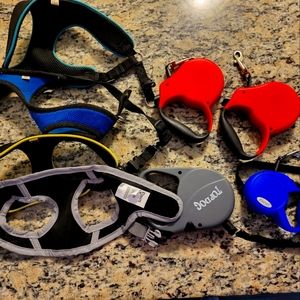 Dog bundle set.    Retractable leashes.    Xs and small harness.    Leash for 3